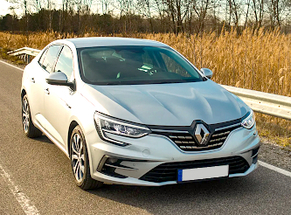 Rent Renault Megane GrandCoupe man in Bucharest Otopeni Airport class Medium